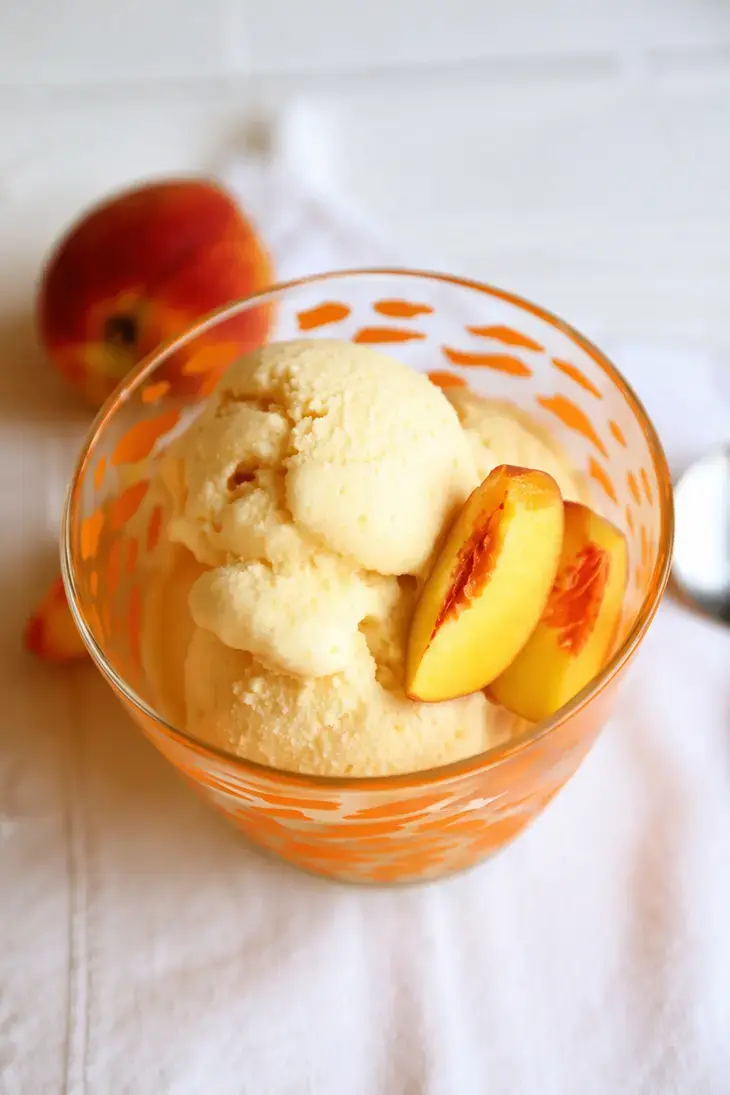 15 Frozen Peach Recipes to Enjoy All Year Long 12 12. Five Minute Peach Ice Cream