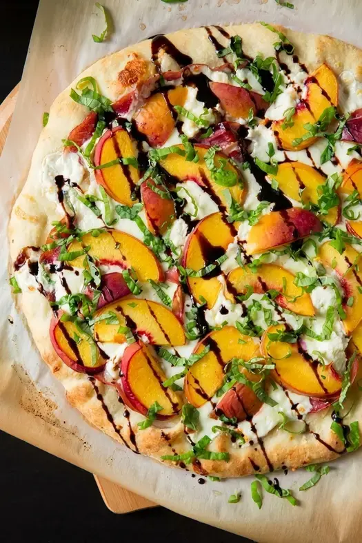 12. Three Cheese Peach and Prosciutto Pizza with Basil and Honey Balsamic Reduction