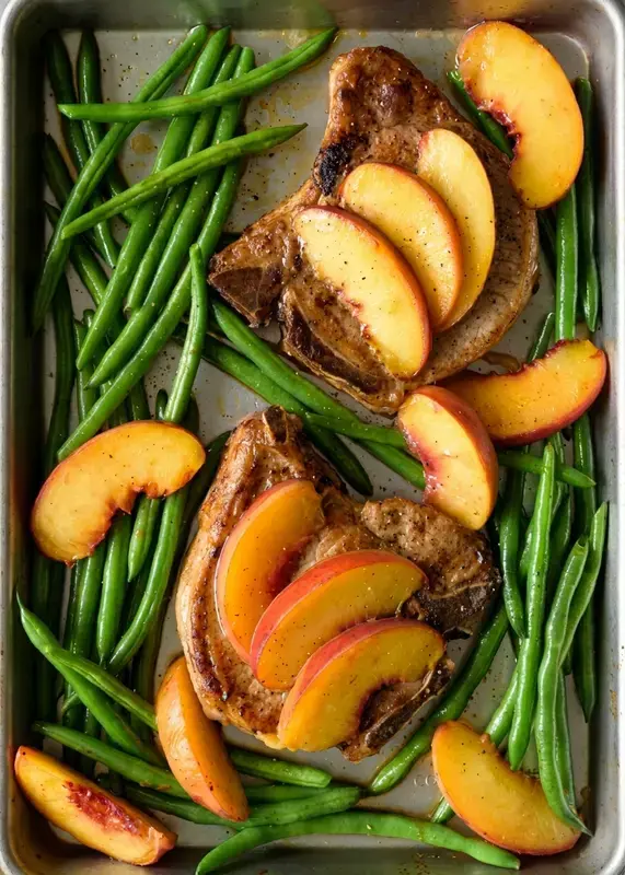 13. Juicy Baked Pork Chops with Peaches and Green Beans