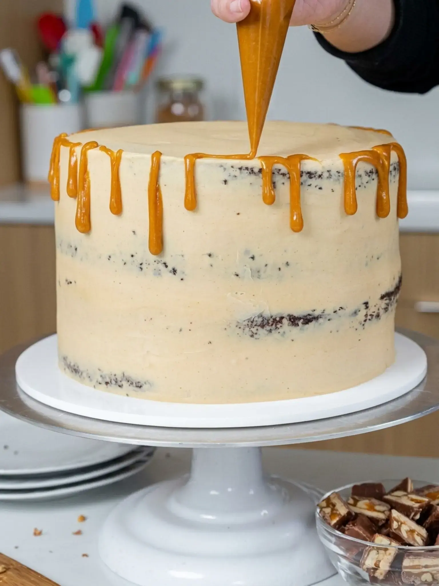 Step 7: Decorate the Chocolate Snickers Cake