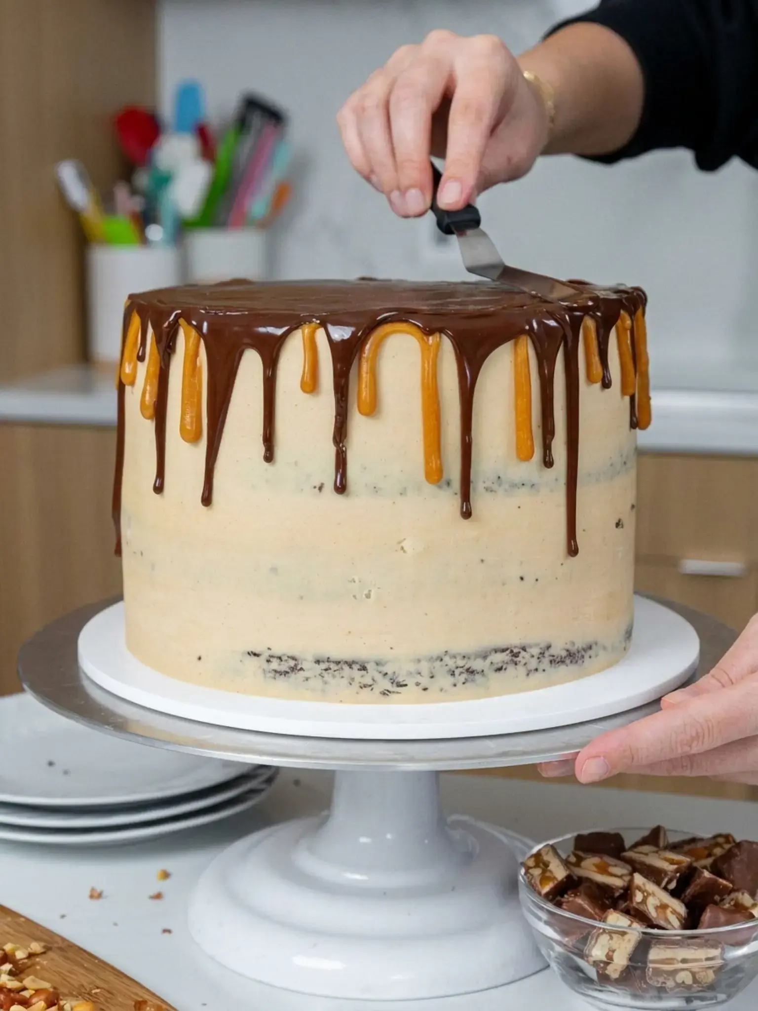 Step 7: Decorate the Chocolate Snickers Cake