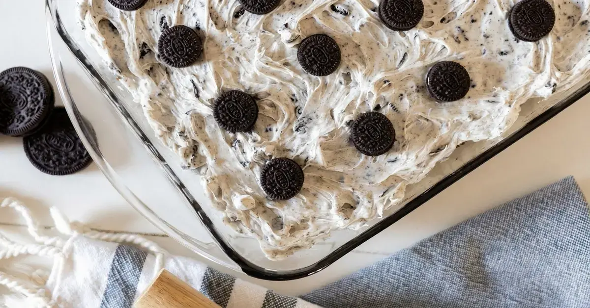 Oreo Sheet Cake Recipe with Cream Cheese Frosting 4 This incredibly easy Oreo sheet cake is a crowd-pleaser for birthdays, barbecues, and gatherings of all kinds. It's one I come back to again and again, and I always get at least one request for the recipe.