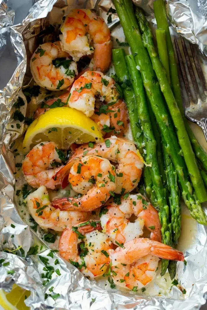 Sunday Grill Dinner Ideas for the Best Backyard BBQ Meals 41 41. Garlic Butter Grilled Shrimp And Asparagus Foil Packets