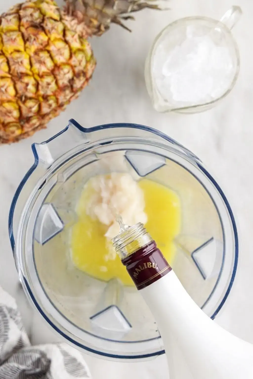 Cream of coconut added to blender carafe