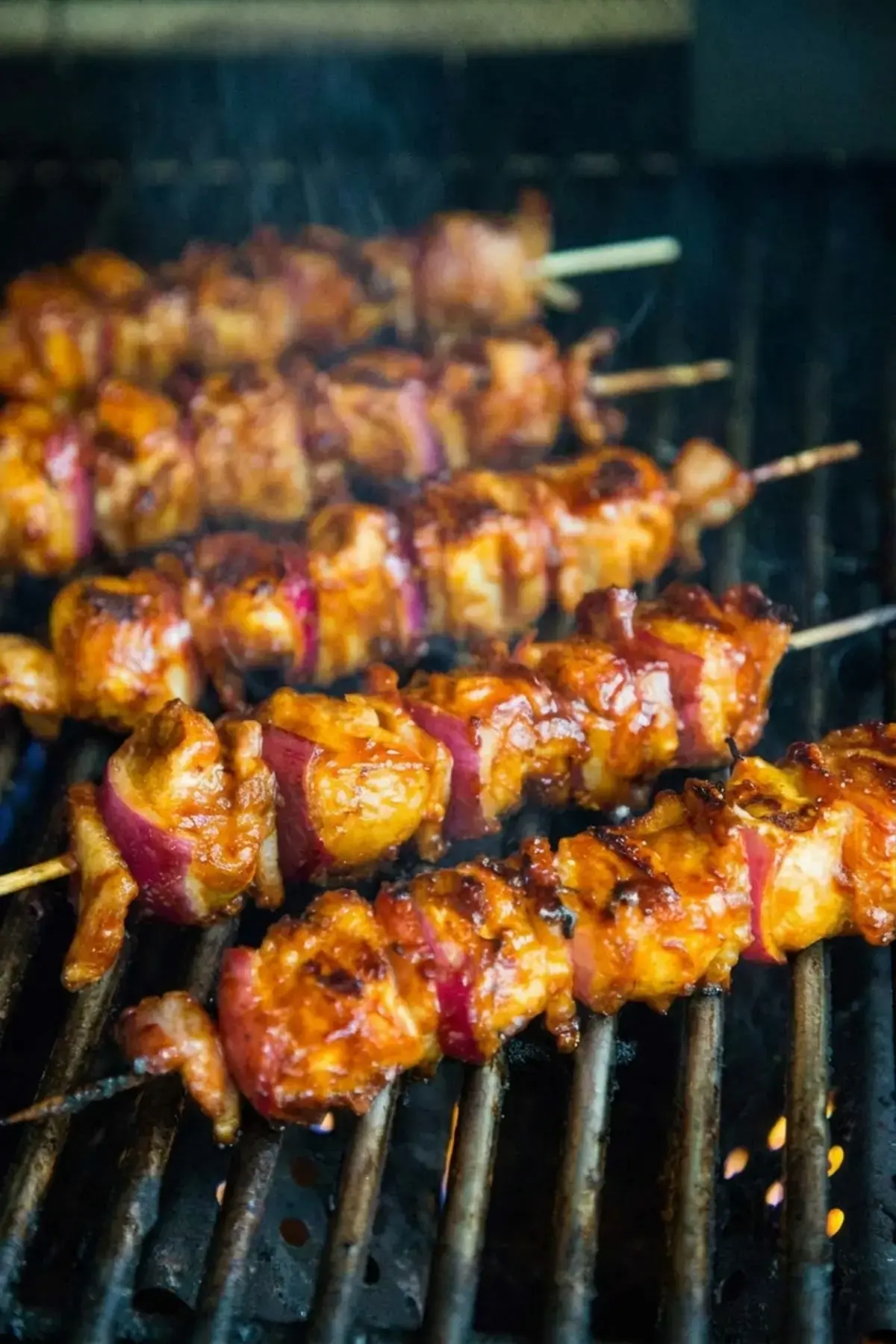 Bacon Bourbon Barbecued Chicken Skewers 6 Chicken bacon skewers browning on the grill