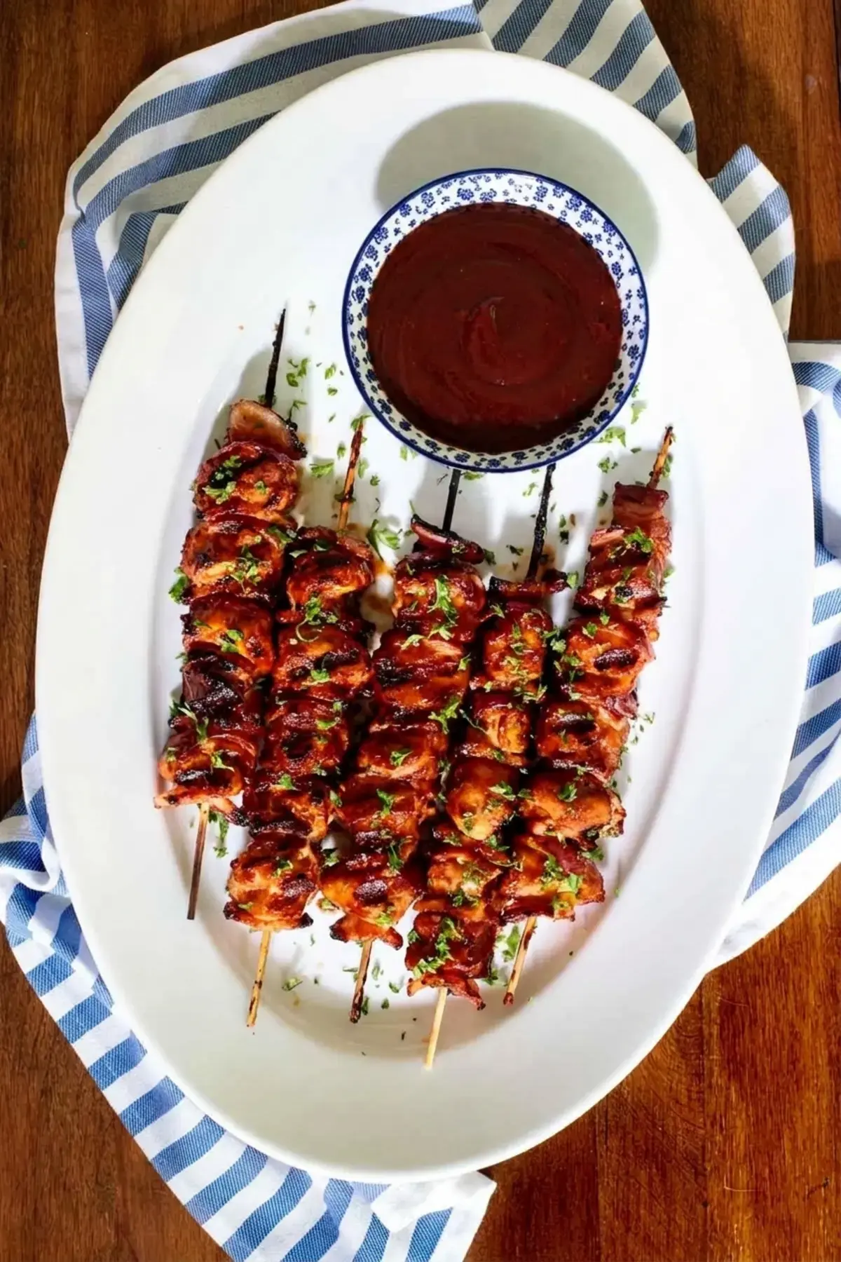 Bacon Bourbon Barbecued Chicken Skewers 1 Bacon bourbon barbecued chicken skewers on a platter