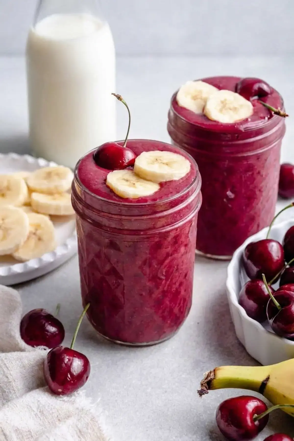 Creamy banana cherry smoothie made with frozen fruit