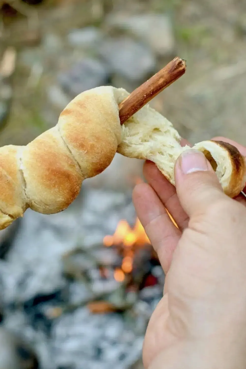 Campfire bread rotated for even browning
