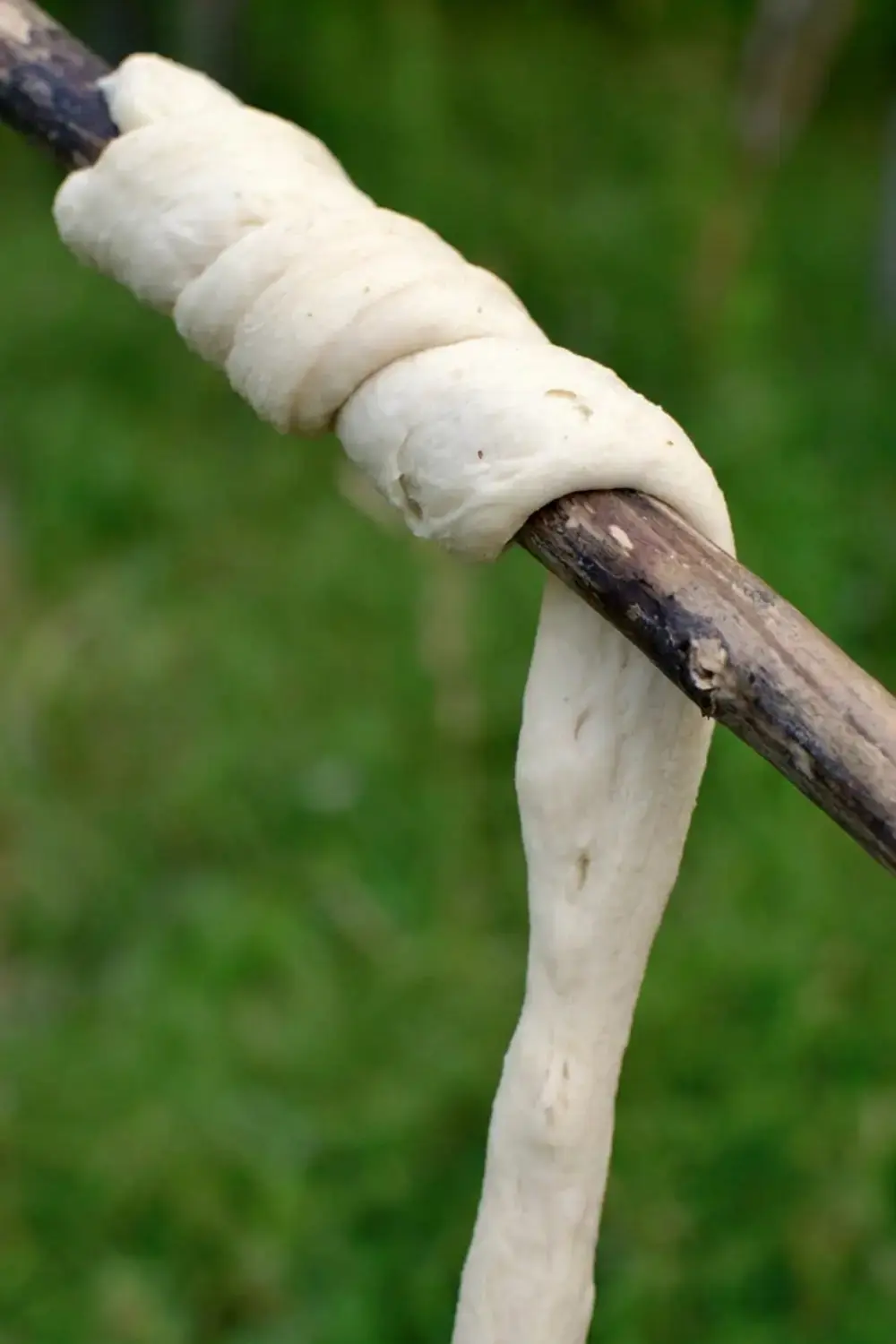 Dough rolled into a long strip for stickbread