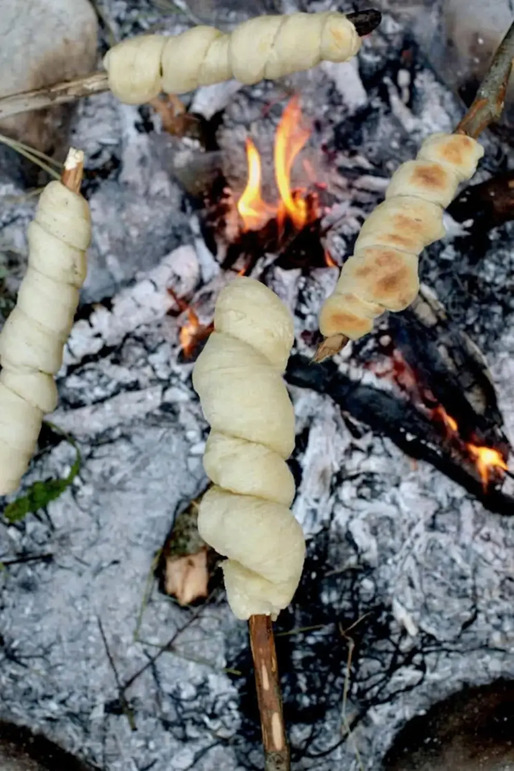 Dough piece stretched into a long strip
