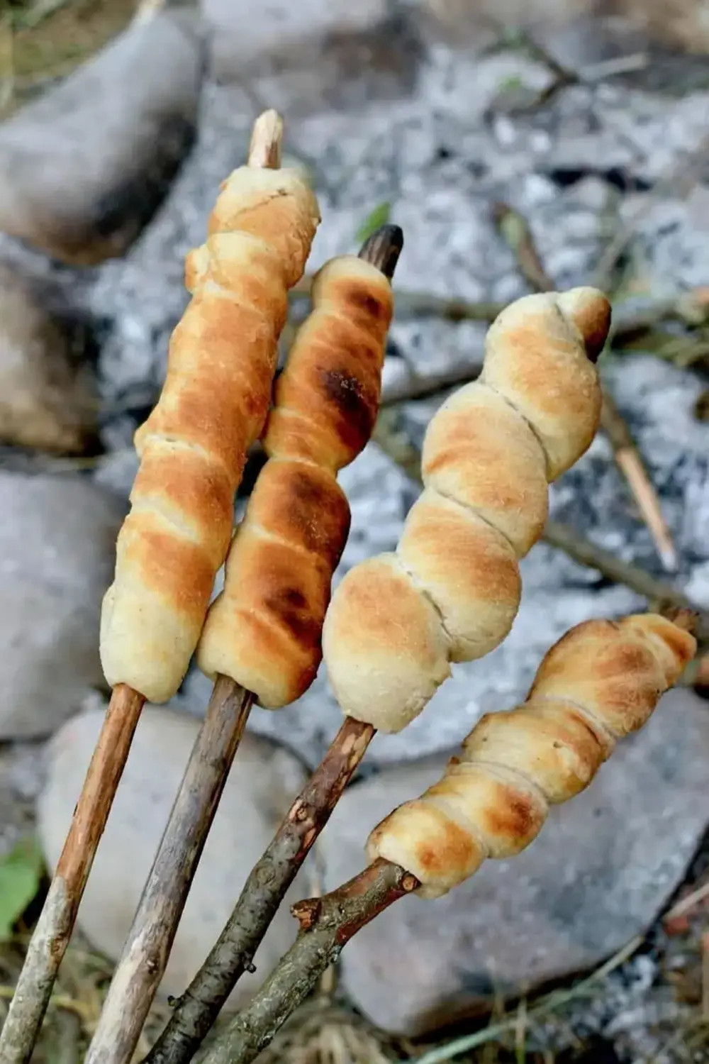 Campfire dough rolled into a long sausage shape