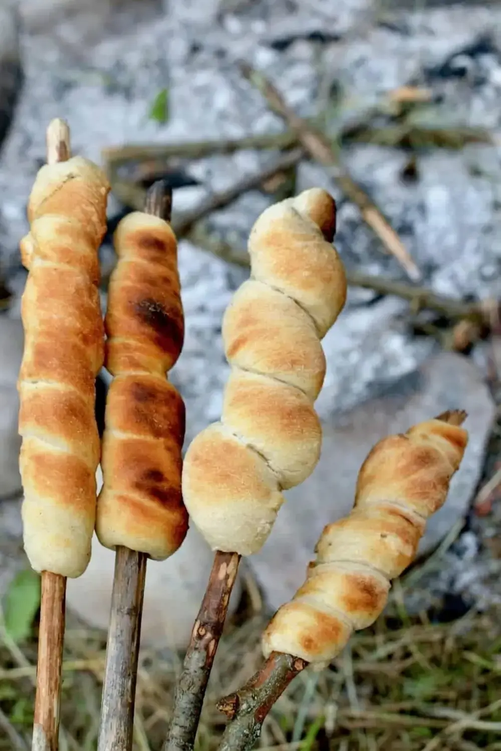 Fresh Campfire Bread on Stick cooked outdoors
