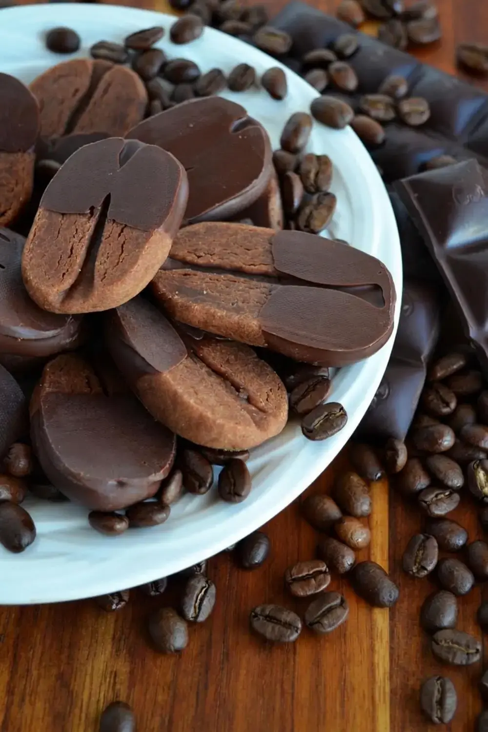 Baked coffee bean cookies cooling on a wire rack