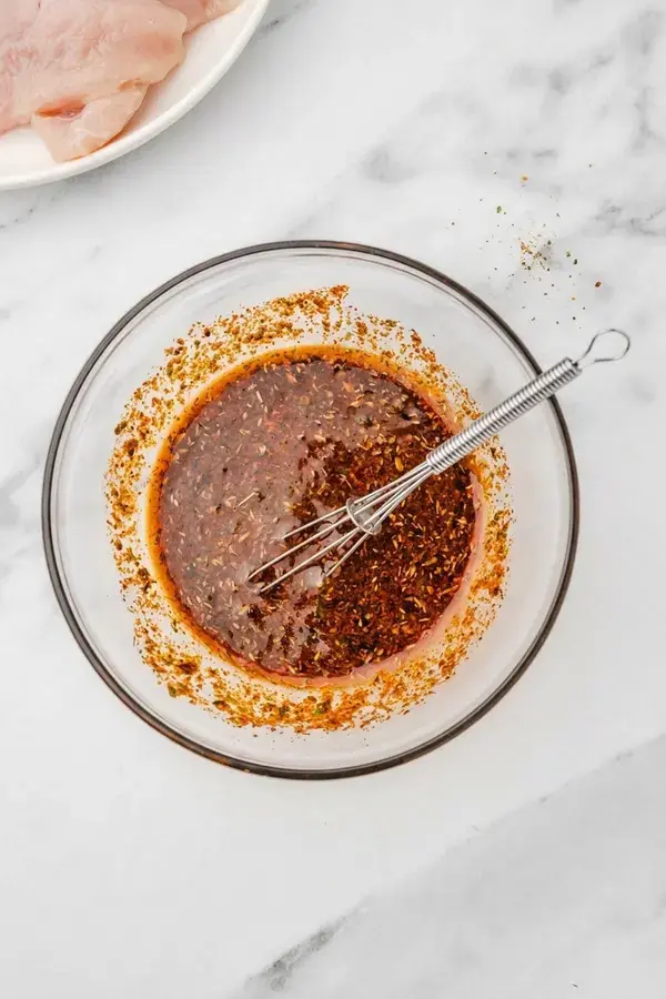 Quick & Easy Mexican Chicken Marinade 5 Mexican chicken marinade whisked in a bowl