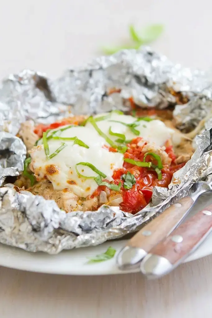 Foil Pack Meals Oven Grill Campfire Recipes for Easy Dinners 5 Caprese Chicken Foil Packets {Grill, Oven or Camping}