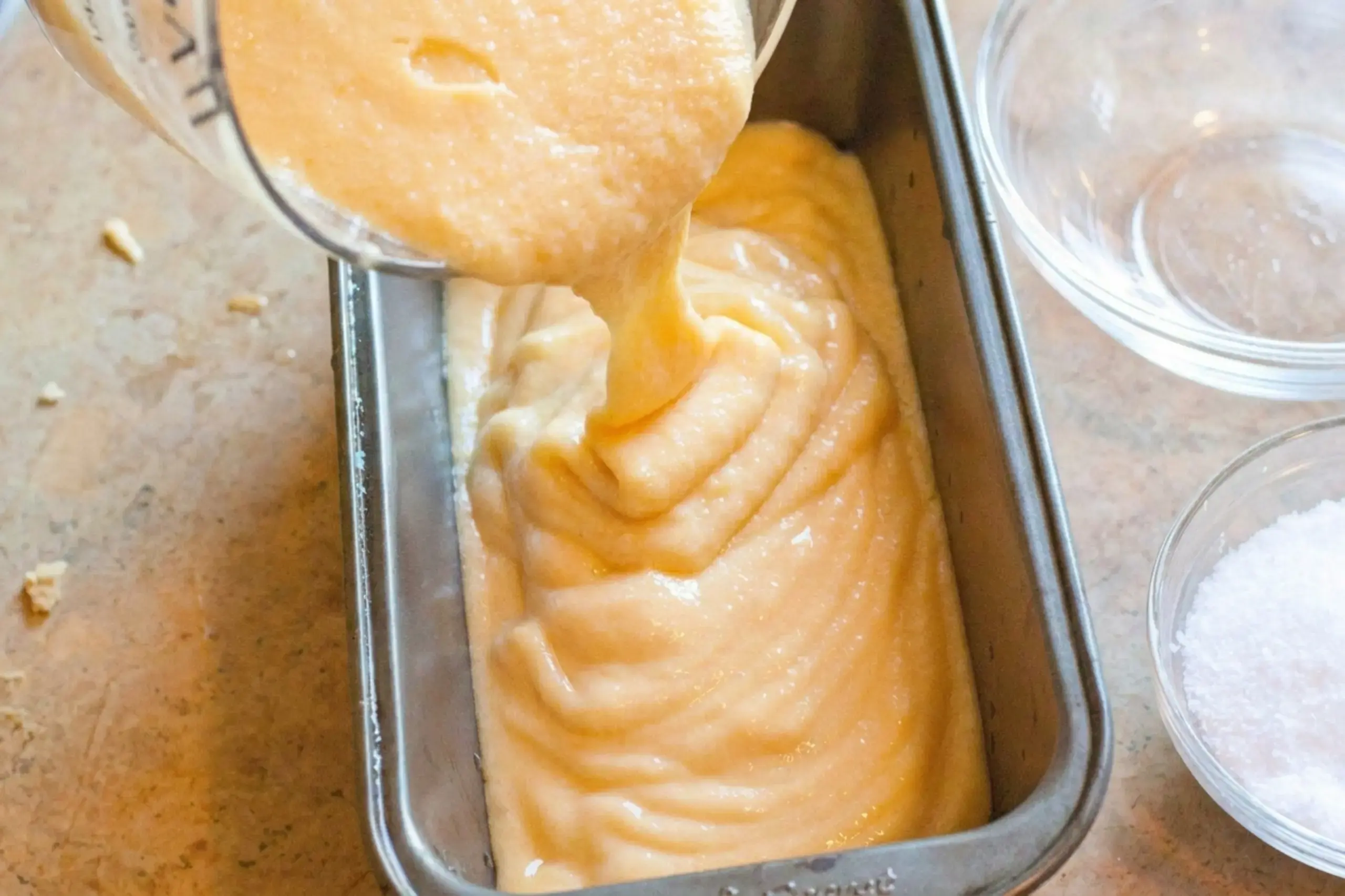 Peach sorbet transferred to a freezer-safe loaf pan