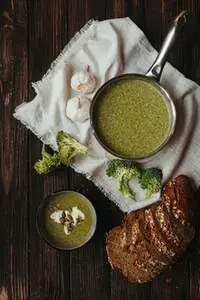 Make Garlic Scape Compound Butter: Recipe, Method, and Tips 12 Garlic scape butter portion served with food