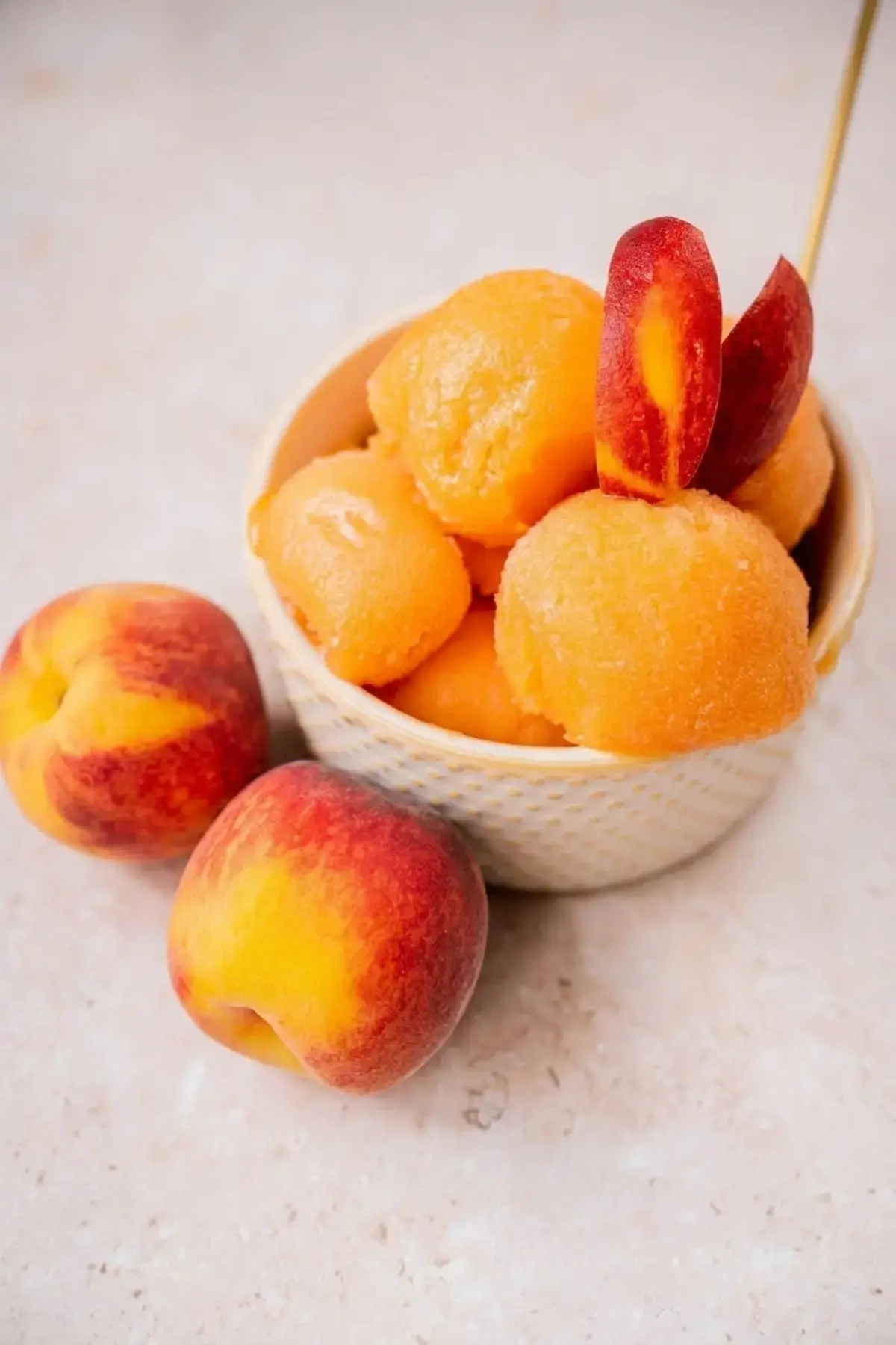 Frozen peach sorbet set firmly in loaf pan