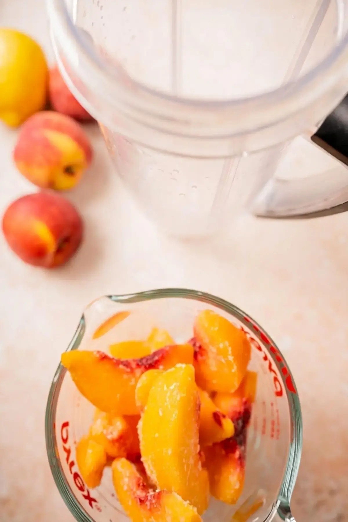 Lemon juice added to peaches sugar and water
