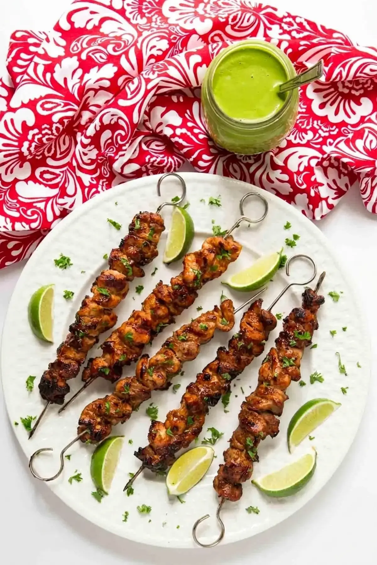 Peruvian Grilled Chicken Skewers with Lime and Ginger 6 Finished Peruvian grilled chicken skewers with charred edges