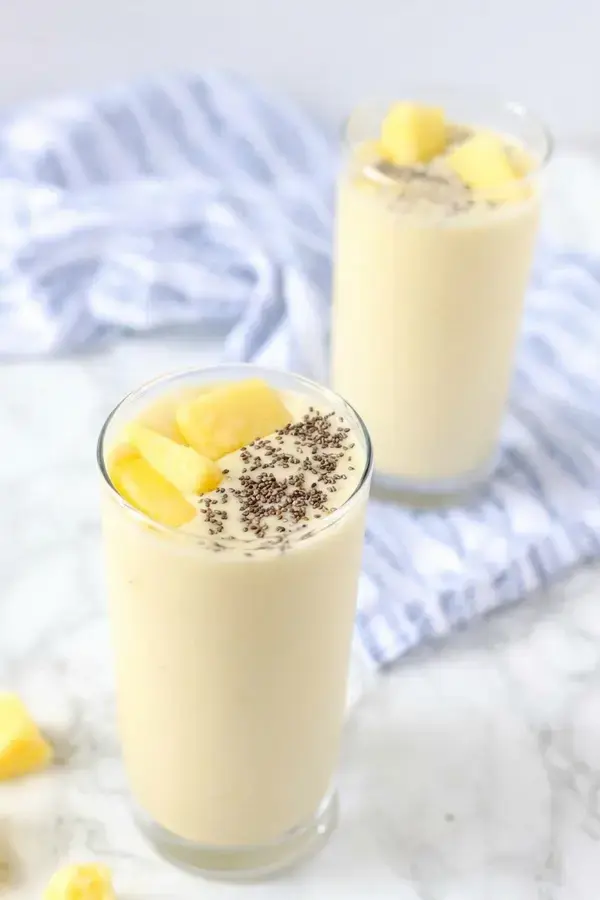 Creamy pina colada smoothie with pineapple and coconut