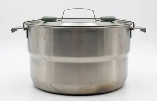 Premade Camping Meals: 45+ Make-Ahead Ideas 3 Premade chili reheated at a campsite