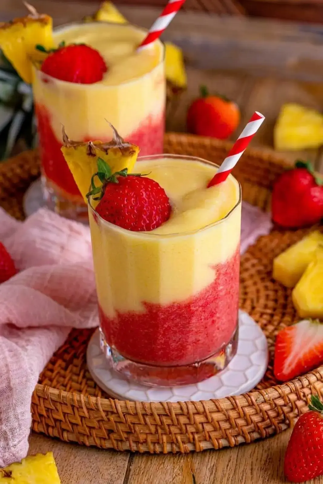 Frozen strawberry rum and pineapple juice in a blender