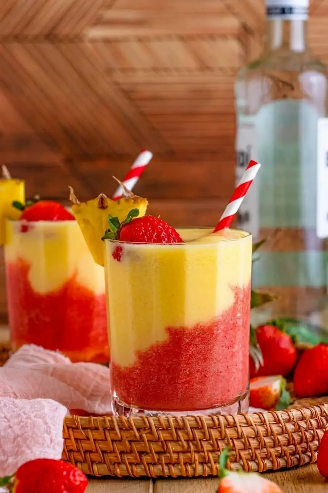 Pineapple coconut mixture layered over strawberry