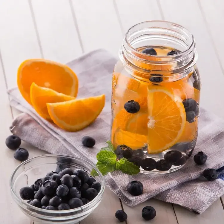 35 Fruit-Infused Water Recipes for Healthy, Sugar-Free Hydration 30 35 Fruit-Infused Water Recipes, Orange, Blueberry and Mint