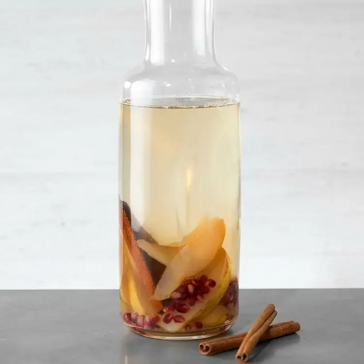 35 Fruit-Infused Water Recipes for Healthy, Sugar-Free Hydration 5 35 Fruit-Infused Water Recipes, Pomegranate and Pear