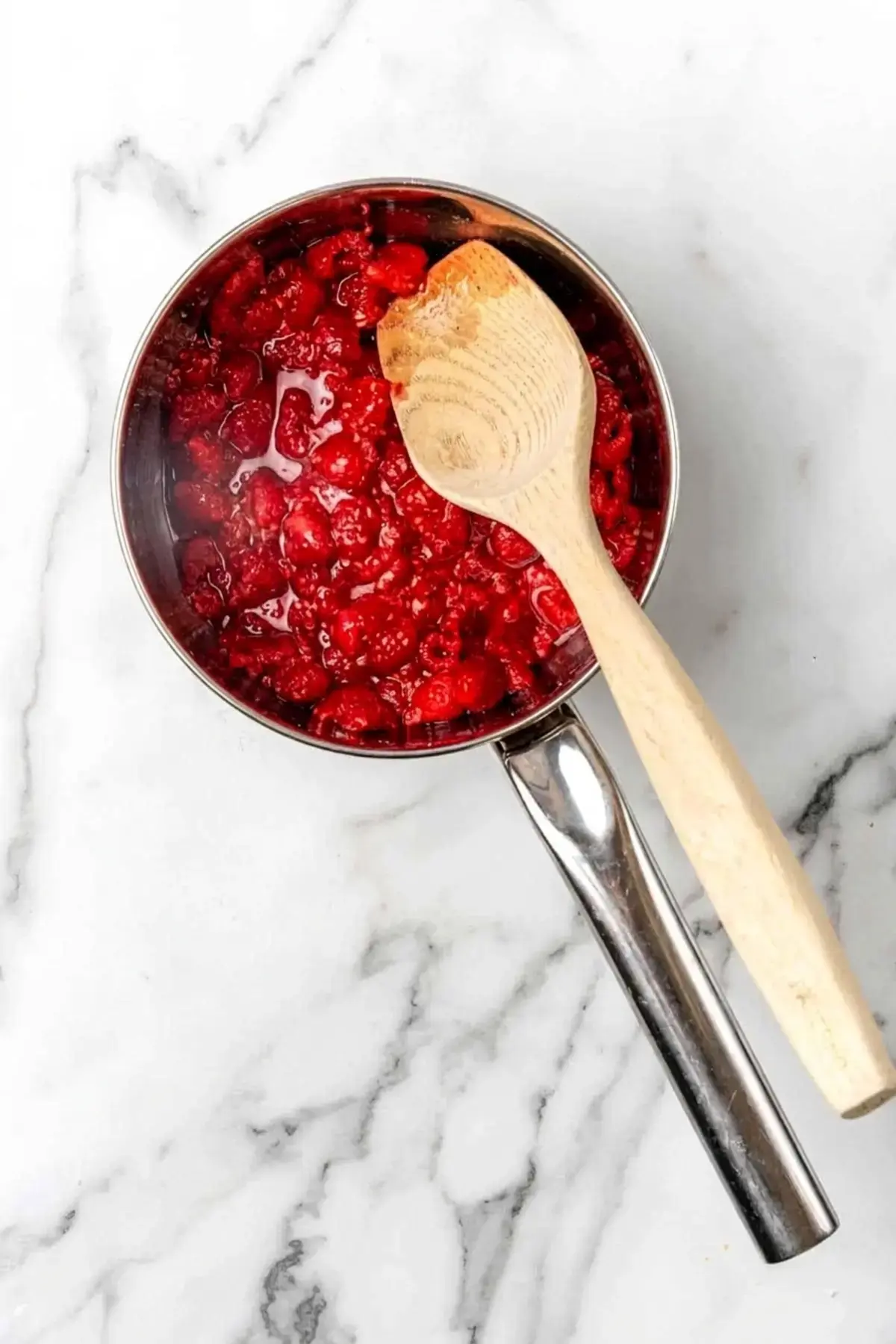 4 Easy Raspberry Sauce Recipes for Every Dessert 6 4 Easy Raspberry Sauce Recipes, Step 1: Cook the raspberries