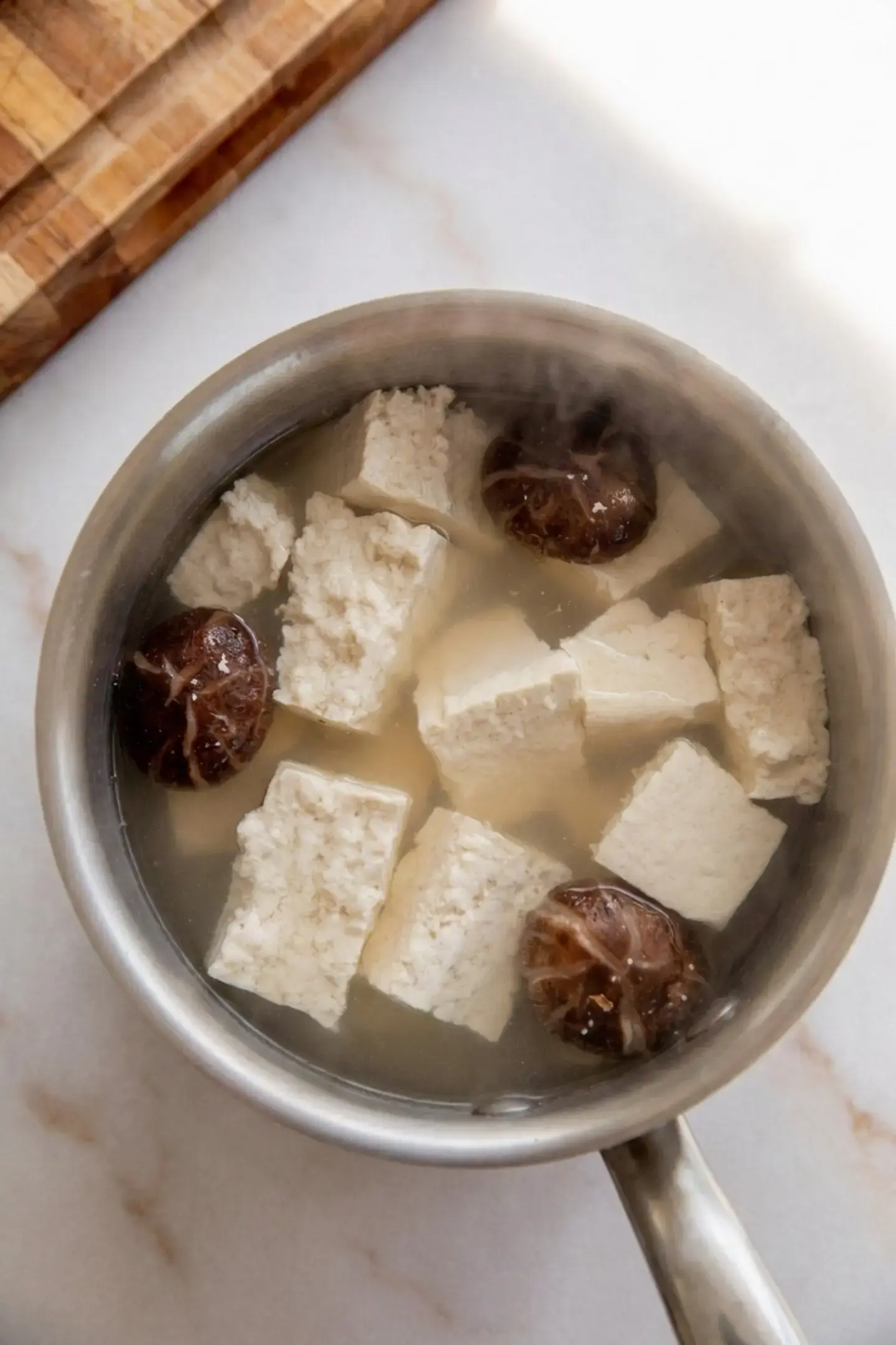 Lemon Glazed Cucumber Tofu Salad: A Bright, Protein-Packed Summer Meal 32 Draining and tearing extra firm tofu into chunks