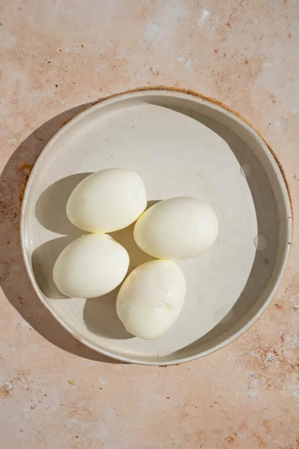 Viral TikTok Egg Boil Recipe with Cajun Butter Sauce 14 Viral Tiktok Egg Boil, Step 3: Cool and Peel the Eggs