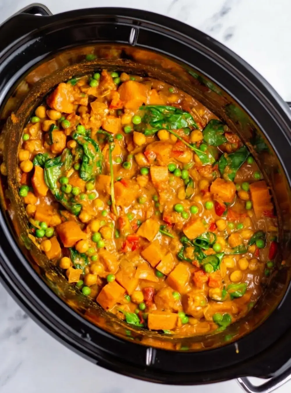 30+ Cheap Crockpot Recipes For Easy Comfort Meals, 27. Slow Cooker Vegetable Curry