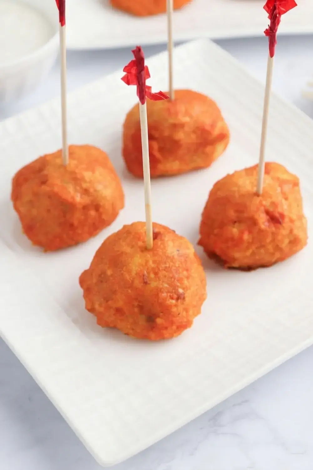 30+ One Bite Appetizers for a Crowd: Easy Finger Foods for Any Party 9 30+ One Bite Appetizers For A Crowd, Baked Buffalo Chicken Meatballs