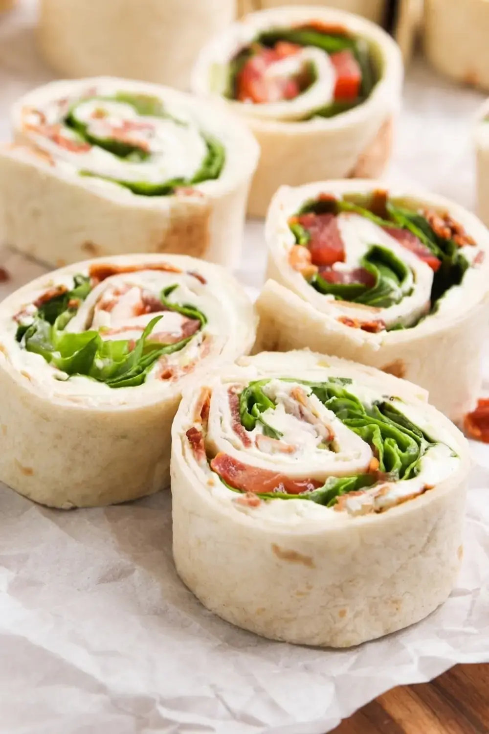 30+ One Bite Appetizers for a Crowd: Easy Finger Foods for Any Party 2 30+ One Bite Appetizers For A Crowd, BLT Pinwheel Sandwiches