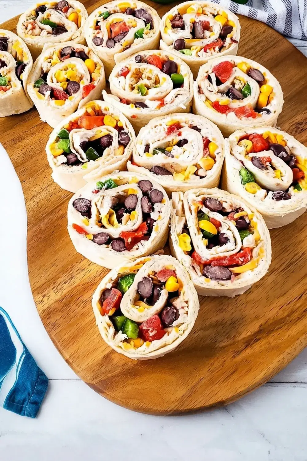 30+ One Bite Appetizers for a Crowd: Easy Finger Foods for Any Party 35 30+ One Bite Appetizers For A Crowd, Southwest Chicken Pinwheels
