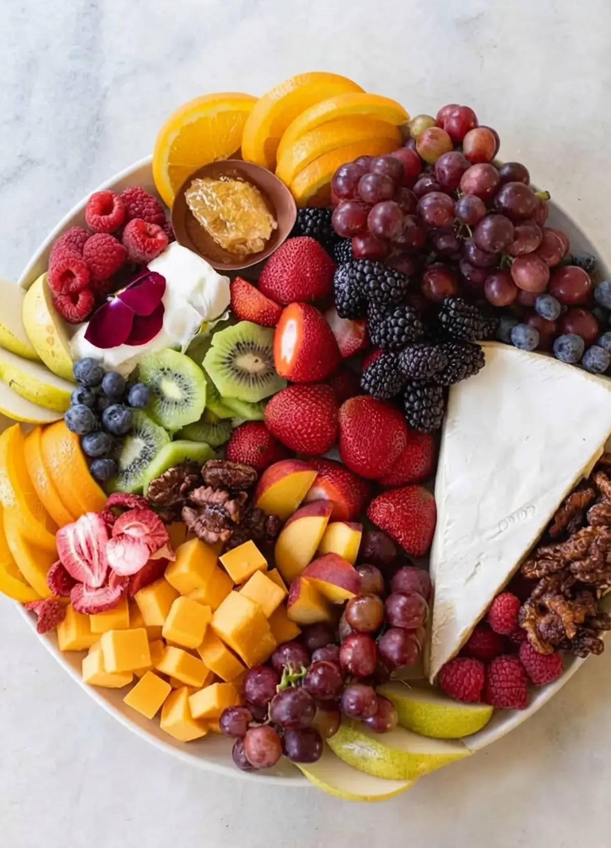 37 Colorfully Delicious Fruit Charcuterie Board Ideas, 17. How To Make The Best Fruit And Cheese Platter