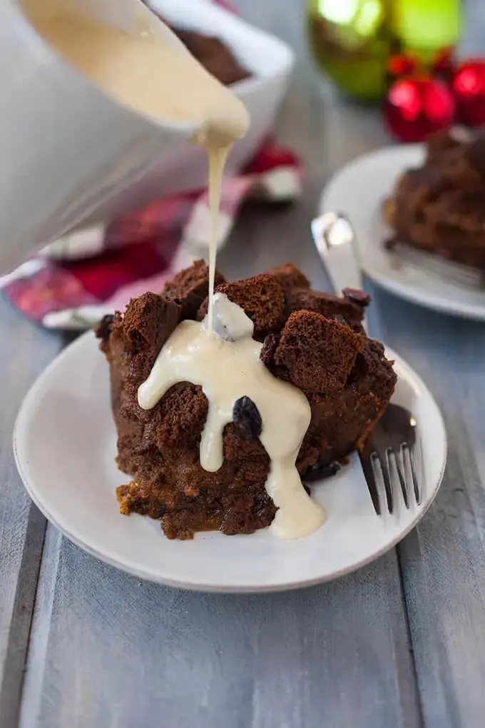 51 Christmas Baking Ideas for Cookies, Cakes, and Festive Desserts 38 51 Christmas Baking Ideas, 38. Gingerbread Bread Pudding with Eggnog Sauce